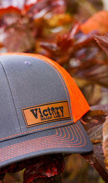 Richardson 112PM | GRY Hat ORG Mesh Trucker Victory Patch