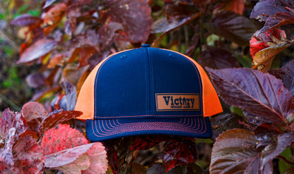 Richardson 112PM | GRY Hat ORG Mesh Trucker Victory Patch